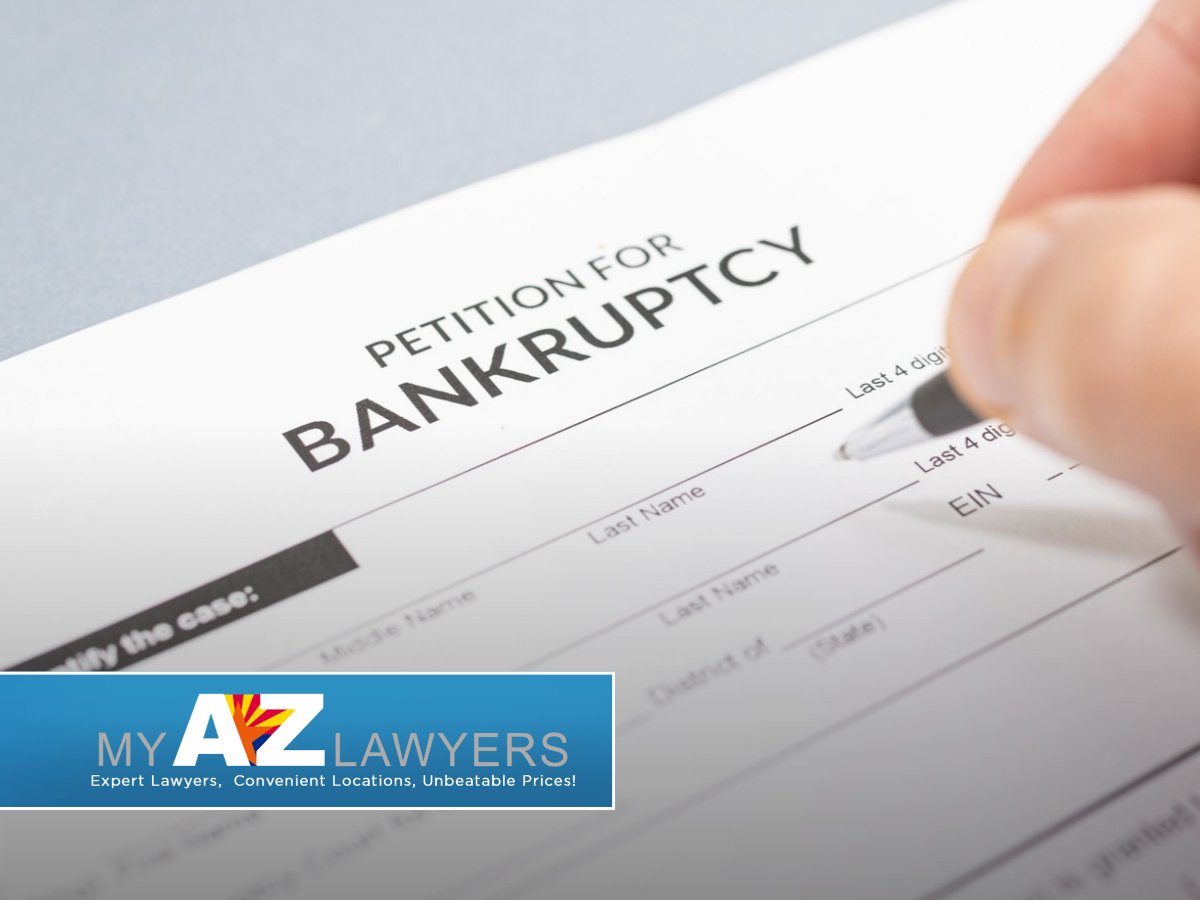 Senior filling out a petition for bankruptcy form in Avondale, AZ